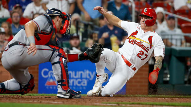 Cardinals’ Tyler O'Neill is tagged out at home by Braves catcher Sean Murphy during the seventh inning of a game.
